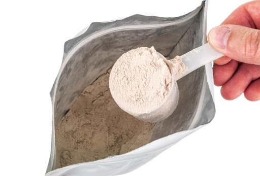 Scoop of supplement powder
